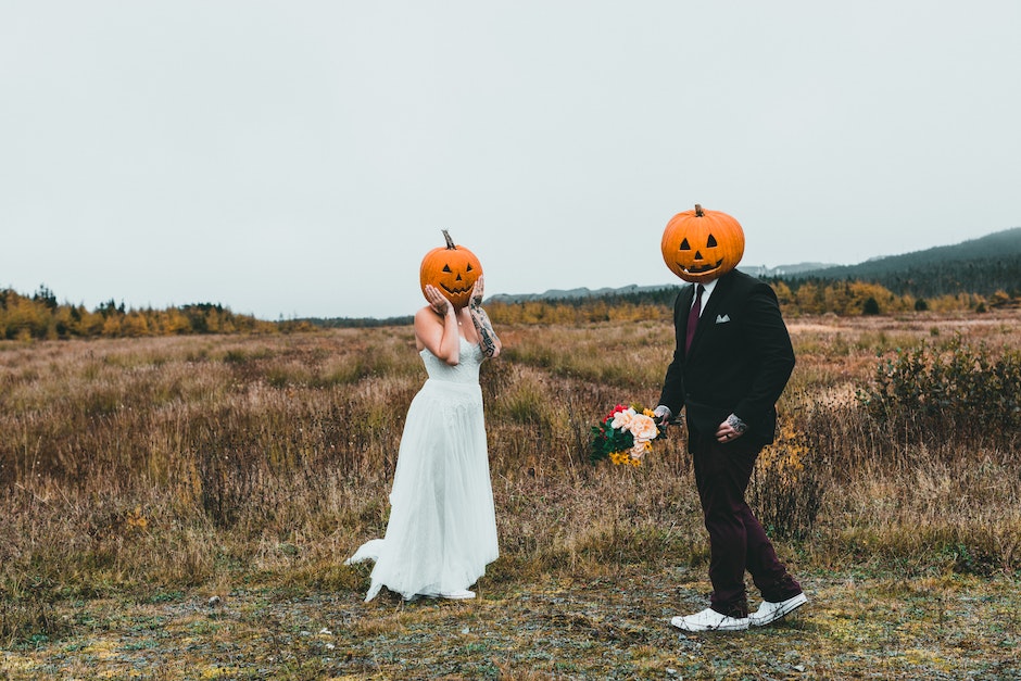 Bride and Groom with Pumpkins on their Heads